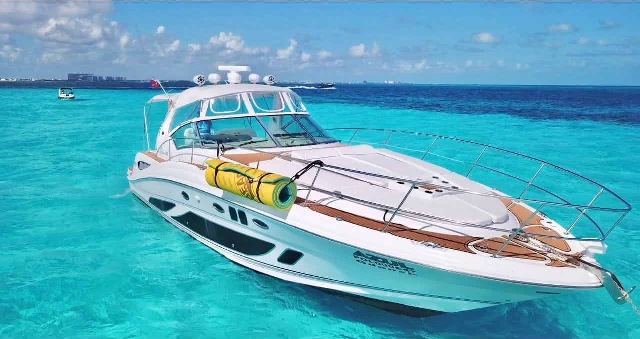 Azul Cancun Yacht Rental cruising in turquoise Caribbean water