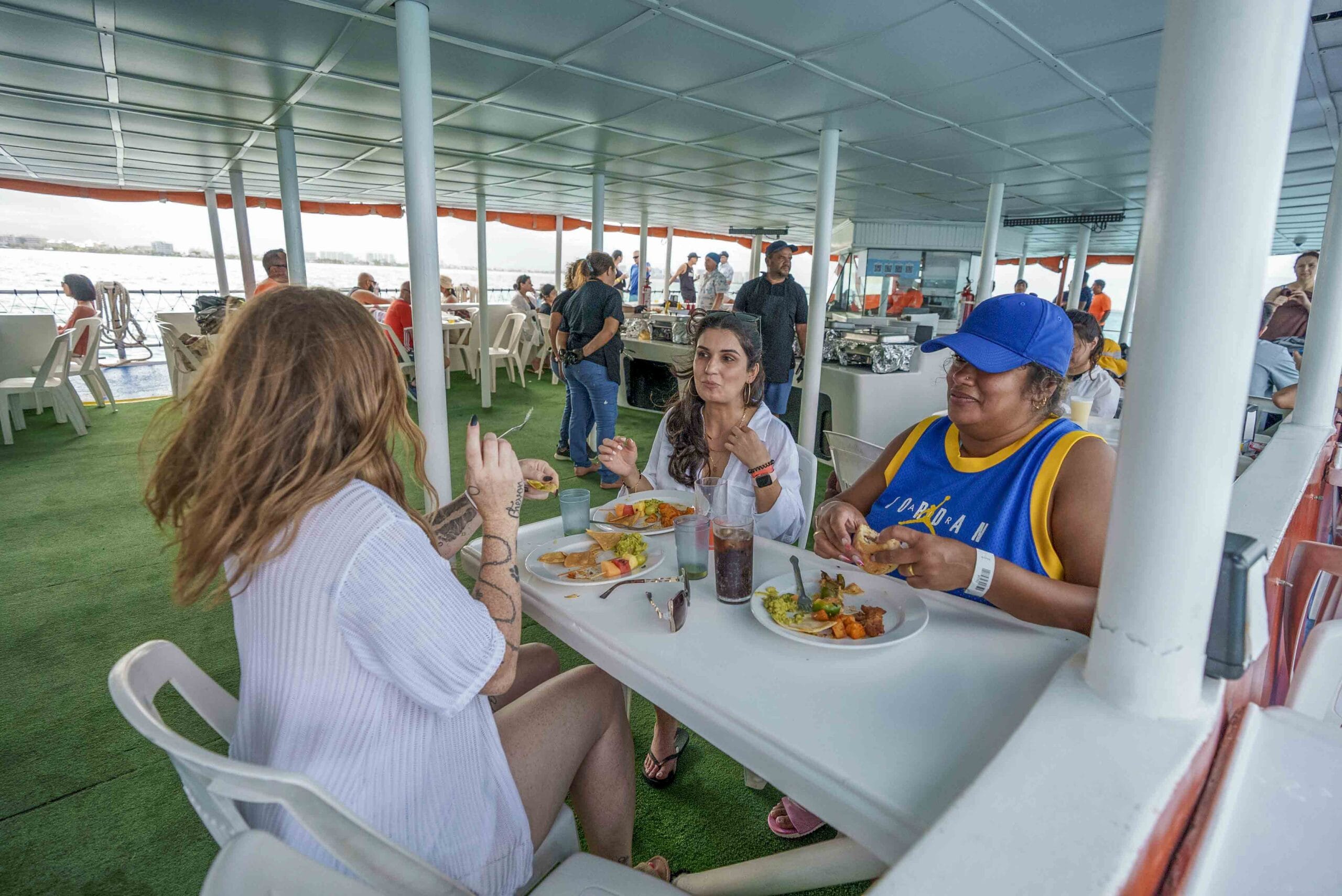 Covered onboard dining area on Dancer Catamaran